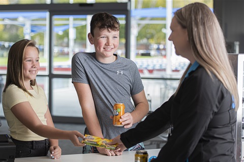 Cafe-staff-serving-2-children-smiling-hero.jpg