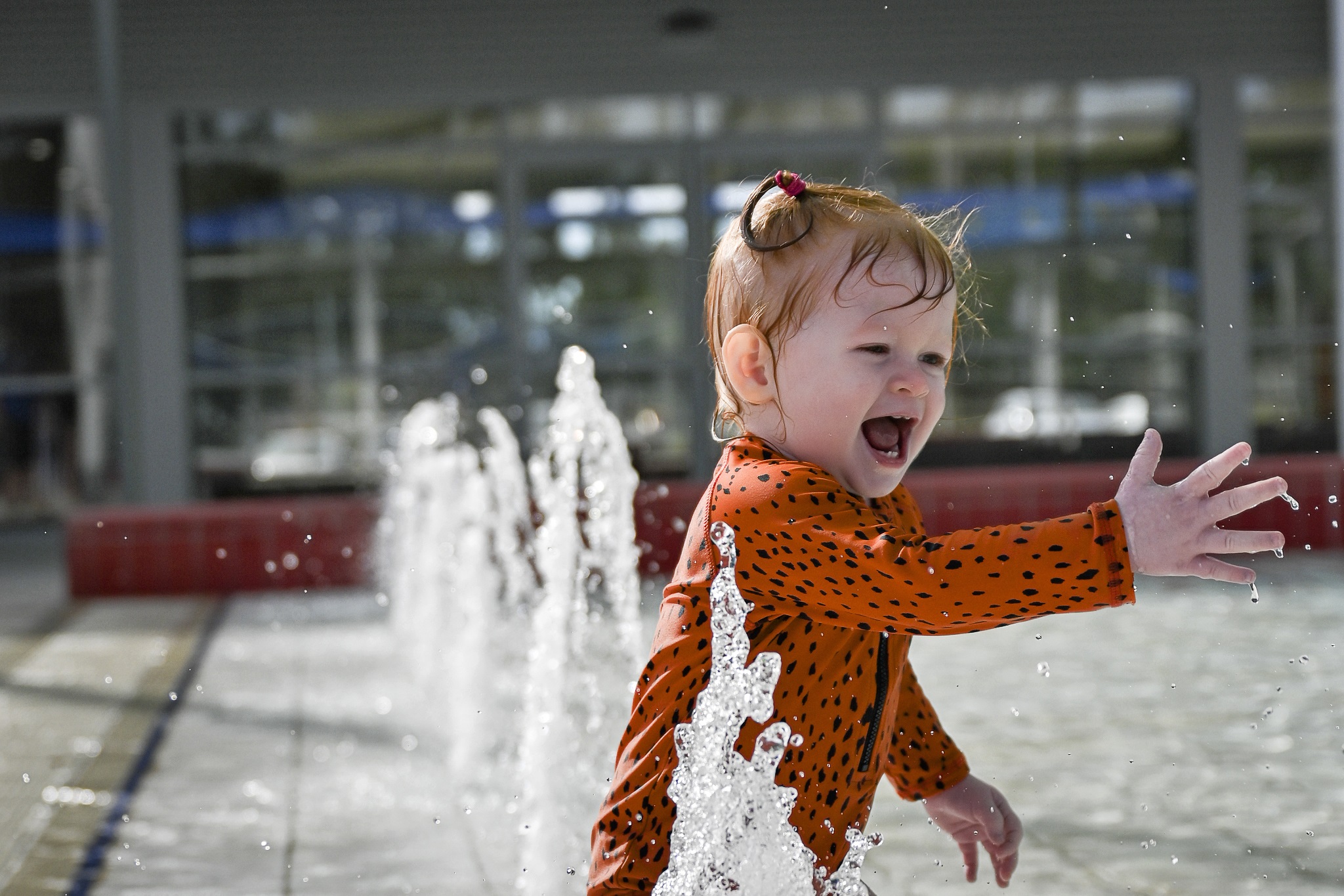 Splash-Park-baby-female-playing-in-water-landscape-hero.jpg